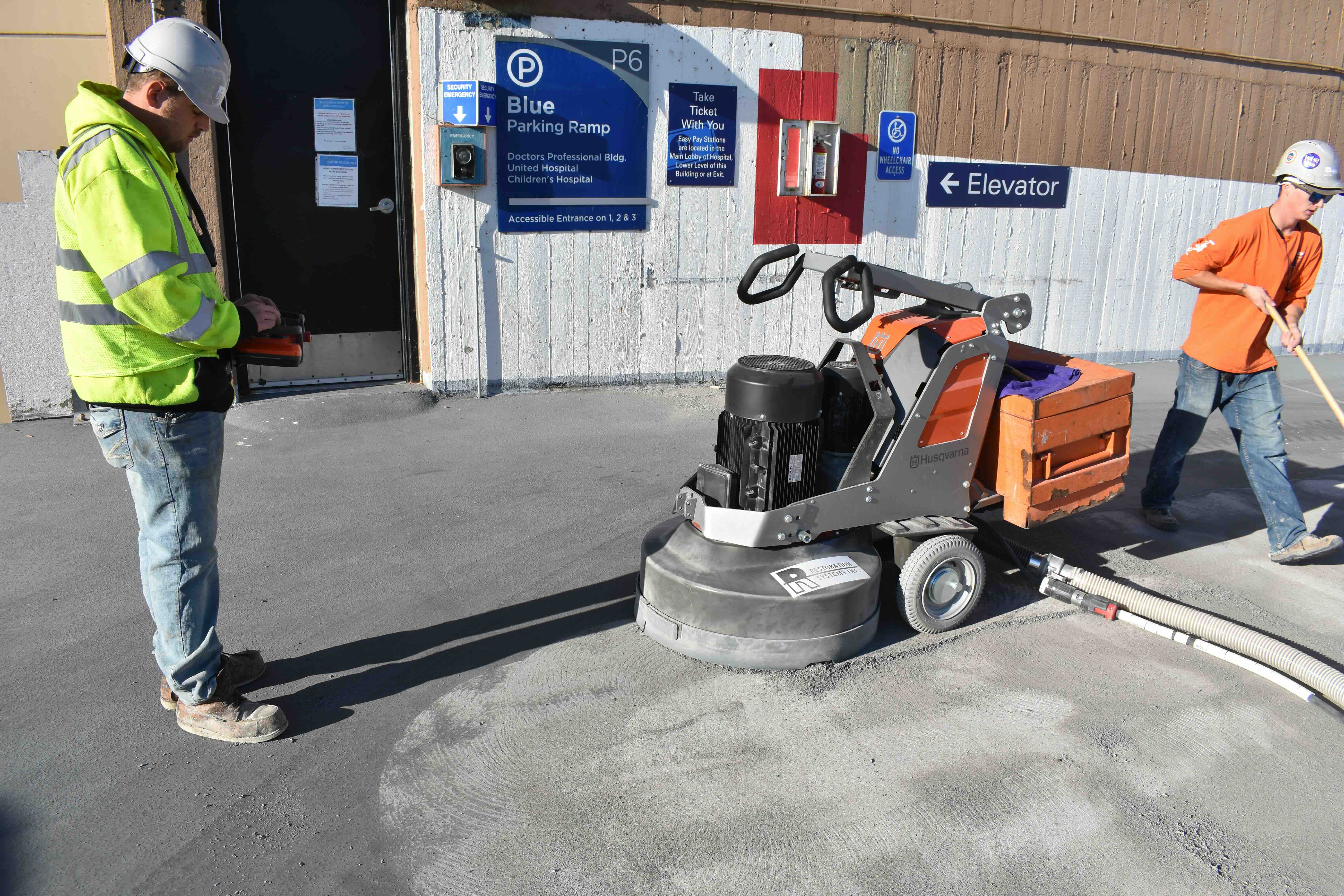 RiverWest Parking Garage in Minneapolis showing professional traffic coating installation over properly prepared concrete surface